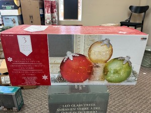 lot 21 image: 3 Piece Glass Ornament Set - MSRP $50