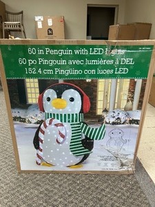 lot 23 image: 60in LED Penguin - MSRP $150