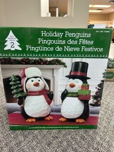 lot 34 image: Set of 2 Holiday Penguins - MSRP $50
