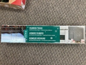 lot 73 image: 2 Piece Flocked LED Birch Trees - MSRP $100