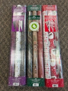 lot 92 image: 9 Rolls Kirkland Wrapping Paper - MSRP $30