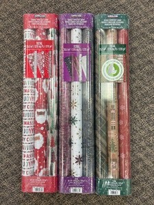 lot 93 image: 9 Rolls Kirkland Wrapping Paper - MSRP $30
