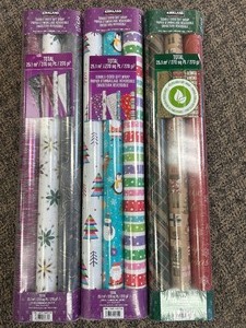 lot 94 image: 9 Rolls Kirkland Wrapping Paper - MSRP $30