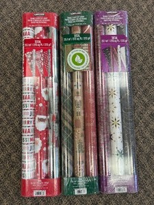 lot 95 image: 9 Rolls Kirkland Wrapping Paper - MSRP $30