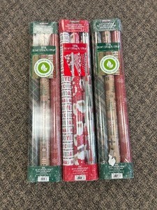 lot 96 image: 9 Rolls Kirkland Wrapping Paper - MSRP $30