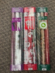 lot 99 image: 9 Rolls Kirkland Wrapping Paper - MSRP $30