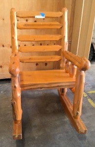lot 9 image: Log rocking chair