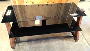 lot 10 image: Modern wood and glass tv stand
