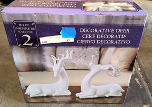 lot 12 image: Pair of decorative white deer