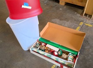 lot 24 image: wrapping paper holder and box of supplies