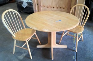 lot 26 image: Blonde round drop side table with 2 chairs