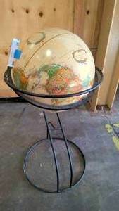 lot 29 image: globe with metal stand