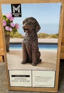 lot 121 image: Copper finish doodle polyresin statue new in box