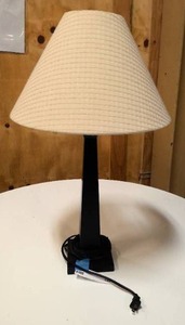 lot 144 image: Black wood table lamp with tan shade