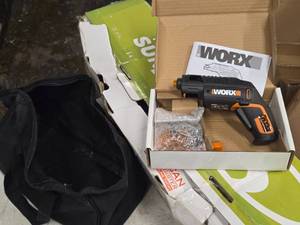 lot 406 image: Worx SD Slide Driver 4V Semiautomatic Driver WX255L (in original packaging) with Tool Bag