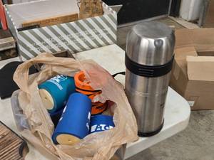 lot 511 image: TravelCenters Of America Travel Thermos and (7) Can Coozies