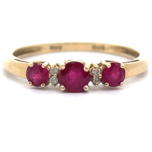 lot 14 image: Oval Natural Ruby & Natural Diamond Three-Stone Ring in 14k Yellow Gold