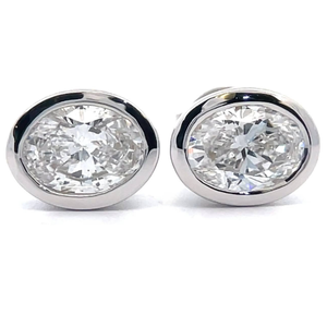 lot 8 image: Modern 2 Carat Diamond Oval Bezel Solitaire Stud Earrings in 14k White Gold VIDEO