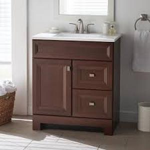 lot 1 image: Home Decorators Collection Sedgewood 30.5 in. W x 18.75 in. D x 34.375 in. H Single Sink Bath Vanity in Dark Cognac with Arctic Solid Surface Top Customer Returns See Pictures