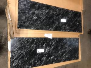 lot 25 image: lot of  Hampton Bay 6 ft. Straight Laminate Countertop  Textured Sombra  Damaged Customer Returns See Pictures
