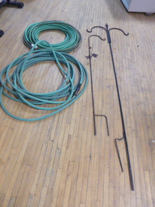lot 12 image: Garden Hoses and Shepherds Hooks