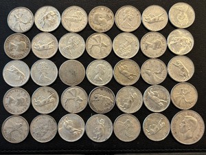 lot 23 image: Silver Canadian Quarters and Half Dollar