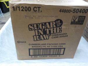 lot 207 image: Case of 1200 Packets Sugar in the R...