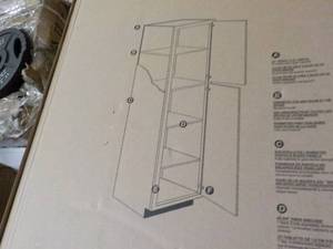 lot 215 image: Home Depot White Assemble Pantry Ca...