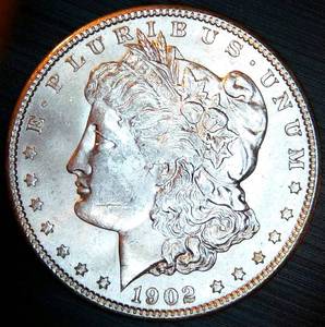 lot 12 image: Uncirculated 1902 O Morgan Dollar, Original Surfaces wnear Full Luster