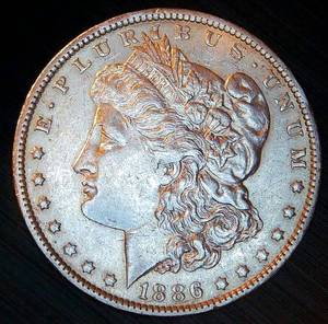 lot 19 image: AU 1886 O Morgan Silver Dollar, Better Date, Original Surfaces