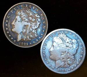 lot 60 image: (2) Circulated Morgan Silver Dollars