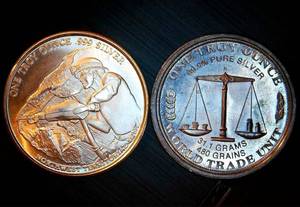 lot 68 image: (2) 1oz .999 Silver Rounds, Sigma verified