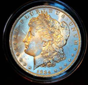 lot 80 image: Uncirculated 1884 O Morgan Silver Dollar, Original Surfaces wnear Full Luster
