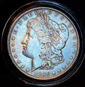 lot 82 image: AU 1886 P Morgan Silver Dollar, Original Surfaces