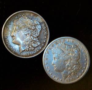 lot 98 image: (2) Circulated Silver Morgan Dollars (actual coins pictured)