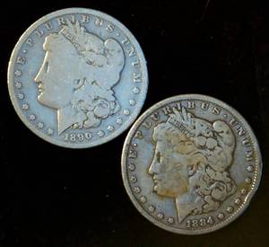 lot 99 image: (2) Circulated Silver Morgan Dollars (actual coins pictured)