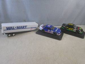 lot 15 image: (EW4) 2 Diecast Race Cars on Bases ...