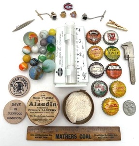 lot 6 image: Collectibles Lot #2 - Vintage Kellogg Oil Company (Glenwood, MN) Rain Gauge, Marbles, Soda Pop Tops, Vintage Mathers Coal Ruler, Wooden Nickels, Guardian Angel Pocket Coin, Tie Tacks, and More
