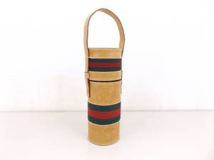 lot 9 image: Authentic 1980s Gucci Bottle Tote
