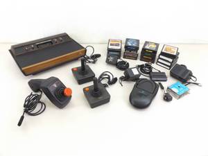 lot 47 image: Vintage Atari Video Game Console and Video Games