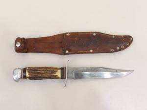 lot 53 image: Vintage Sabre Bone Handled Leather Sheathed Fixed Blade Knife