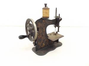 lot 88 image: Antique F.W. Muller Toy Sewing Machine