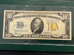 lot 1 image: 1934 A Yellow Seal $10 Silver Certificate N. Africa