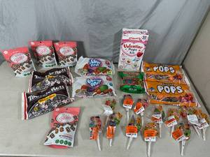 lot 73 image: Assorted Candy, Halloween Suckers, Roca Bites, Tootsie Rolls, Blow Pops, Haribo, and More