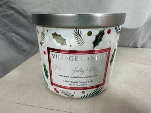 lot 199 image: New Village Candle 3 Wick Holly Jolly Nights Candle