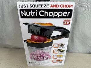 lot 217 image: New Nutri Chopper with Storage Container