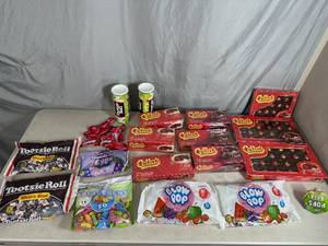 lot 104 image: Assorted Candy, Chocolate Cherries, Blow Pops, Tootsie Rolls, Fruit Chews, and More