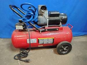 lot 43 image: Powermate 8-gallon Air Compressor.