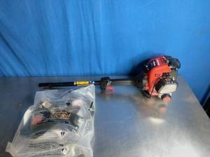 lot 30 image: Troy-Bilt Gas String Trimmer25cc 2-Cycle Engine