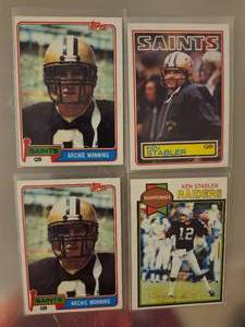 lot 165 image: 1981 Topps football trading cards featuring two NFL quarterbacks.